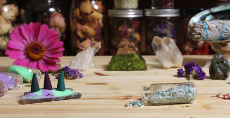 Incense Cones on Stone Slab With Crystals and Flowers