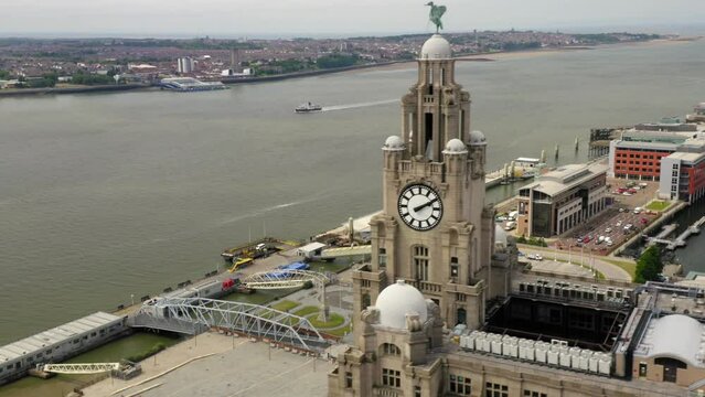 Liverpool liver building rotation showing river Mersey with mersey ferry in frame.