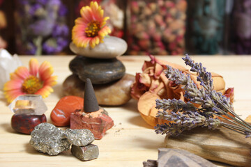 Incense Cone on Stone Slab With Crystals and Flowers