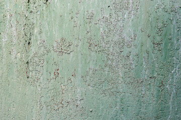 Worn and peeling paint on a metal surface. Abstract background. Vintage.