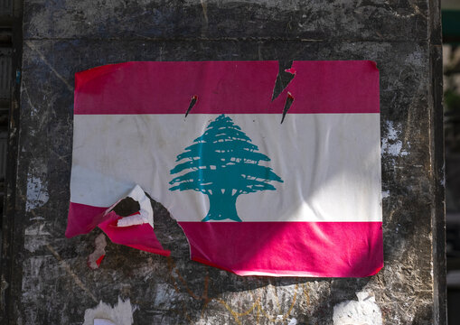Lebanon flag poster teared on a wall, Beirut Governorate, Beirut, Lebanon