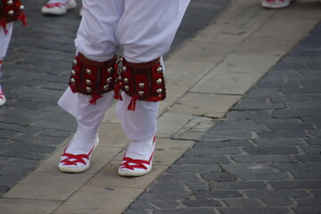 Fototapeta na wymiar Basque folk dancers in the street