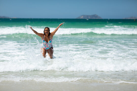 splashing in the shallows at Middleton Beach