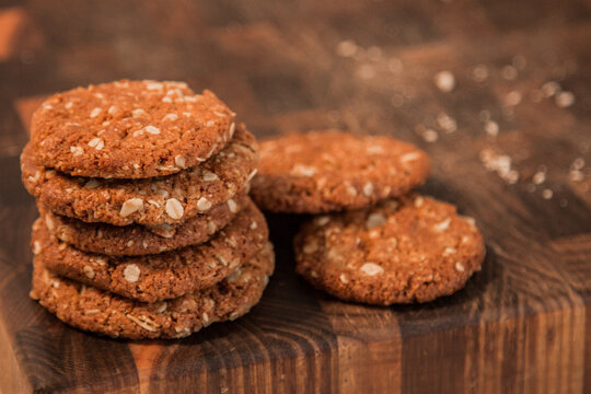 ANZAC biscuits on a chopping board