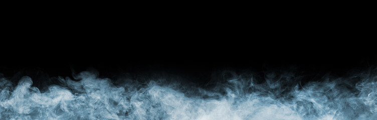 Abstract smoke texture frame over black background. Fog in the darkness. Natural pattern.
