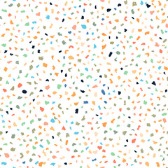 Terazzo seamless pattern composed of pieces of granite, quartz, glass and stone. Marble floor texture. White classic paving design. Abstract wall background. Retro venetian stone material