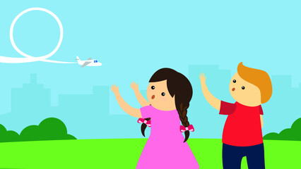 Boy and girl watching the plane in the sky
