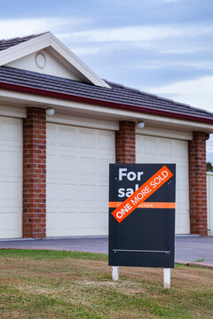 Sign Outside Of House Saying Sold