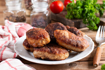 Delicious homemade cutlets in bowl. Chicken cutlets.