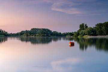 Shortly after sunset at Giftener See. Red buoy as foreground subject.