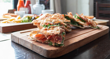 crispy ham pizza puff on table