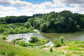 Fototapeta na wymiar Summer fresh landscape of rocks and Kurapovo river in Lipetsk region