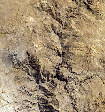 Top view of the Ubinas Volcano, Peru, Free of vegetation, the gray and white lava covered peak of the Ubinas Volcano. Hard rocky surface texture. Elements of this image furnished by NASA.