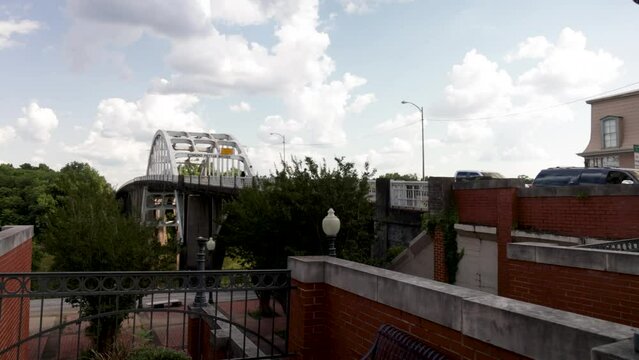 Edmund Pettus bridge in Selma, Alabama with gimbal video walking forward in plaza with slow motion.