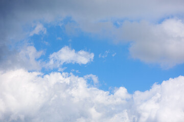 cumulus clouds on the blue sky. weather change forecast