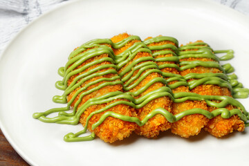 Fried Banana with various topping, chocochip, Matcha, and chocolate