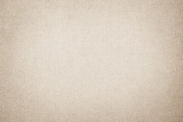 Brown recycled craft paper texture as background. Cream paper texture, Old vintage page or grunge vignette. Pattern rough art creased grunge letter. Hardboard with copy space for text.	