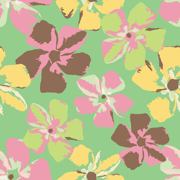 seamless plants pattern on green background with pastel flowers , greeting card or fabric
