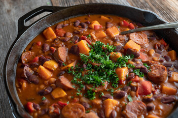 Mexican bean stew with chorizo salami, sweet potatoes and vegetables