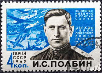 USSR - CIRCA 1965: Postage stamp printed in the USSR, shows the hero I.S. Polbin and the battle scene, circa 1965