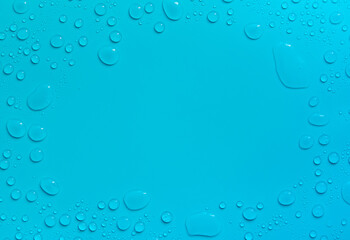 Drops of liquid, moisturizing cosmetic product. Hyaluronic acid. Selective focus.