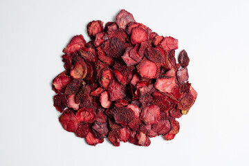 Natural Dried Strawberry slices snack. Dried Strawberry for baking. Dehydrated dry strawberries. Isolated white background.