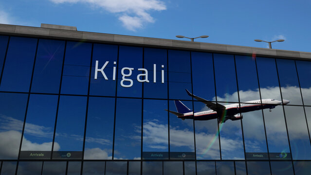 Airplane landing at Kigali Rwanda airport mirrored in terminal