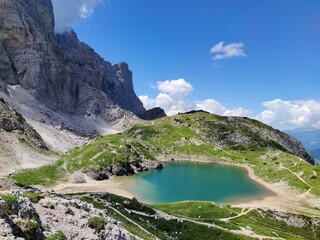 The Alpine lake Coldai is in the area of the Civetta, in the Dolomites. Trekking in Italy