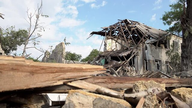 Debris lies on the ground in front of a destroyed primary school that was hit with a Russian missile during the war in Ukraine.