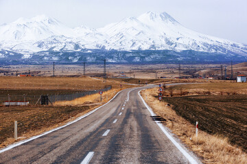 Beautiful landscape with road and mountain range silhouette in Turkey.