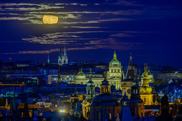 A full moon above czech National museum in Prague. 