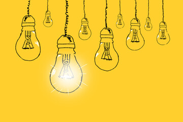 Set of light bulbs hand drawn on a yellow background. Concept of unique thinking. Idea concept.