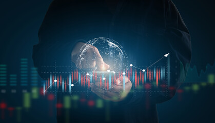 Man using mobile phone view check trading information, stocks, gold, oil price, concept of internet technology that can view all kinds variety transaction of trading information anywhere in the world.