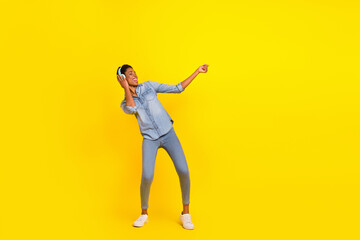Fototapeta na wymiar Full size portrait of positive person chill entertainment enjoy melody isolated on yellow color background
