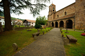 Fototapeta na wymiar Estelas funerarias,iglesia de la Asunción(s.XVIII).Etxalar. Navarra.España.