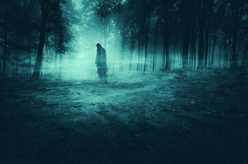 horror forest landscape with scary ghost