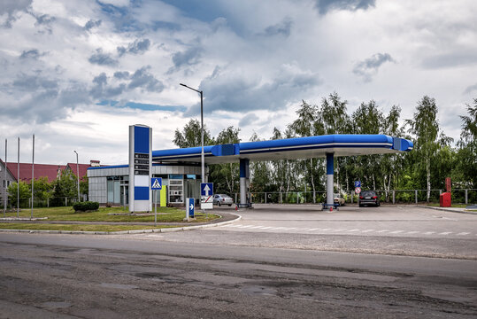 Gas station under cloudy sky