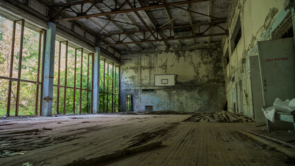 Inside sports complex destroyed abandoned building House Culture Energetik in ghost city Pripyat...