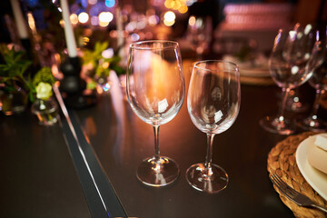 Glass goblets on the table. Glass goblets for wine or champagne 