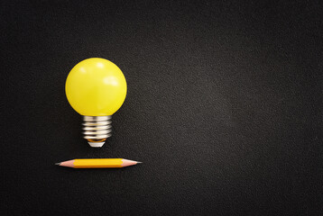 Education concept image. Creative idea and innovation. light bulb metaphor over black background