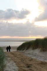 walker on the beach of the north sea island langeoog