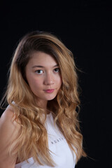 Fototapeta premium Lovely young woman looking thoughtful