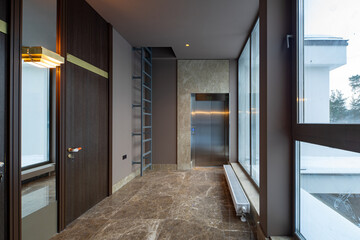 Modern marble interior of entrance hall in luxury residential building