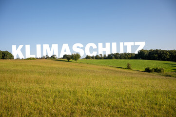 Fototapeta na wymiar Landschaft mit dem Schlagwort KLIMASCHUTZ