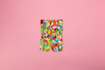 pink wallpaper with colorful paper as copy space, creative art modern design, abstract background,...