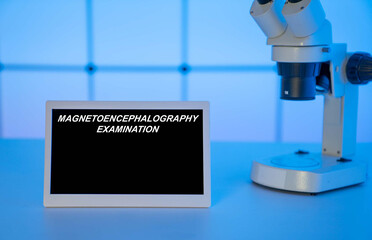 Medical tests and diagnostic procedures concept. Text on display in lab Magnetoencephalography...