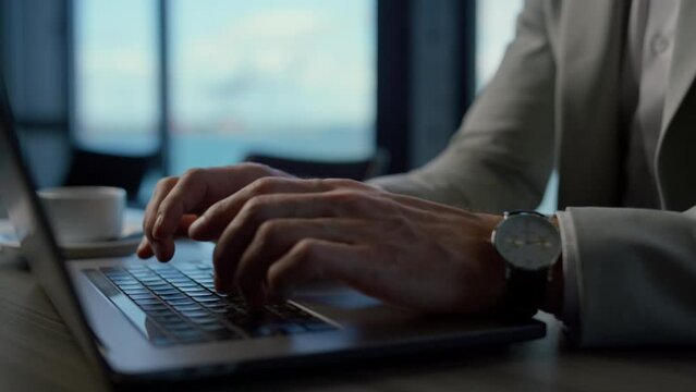 Businessman hands working computer sea view office close up. Boss writing email
