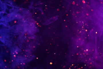 Neon smoke clouds and shiny glitter lights bokeh abstract cosmic fantasy background