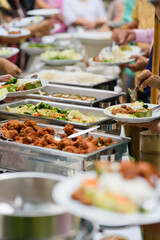 scooping the food, catering, dinner time
