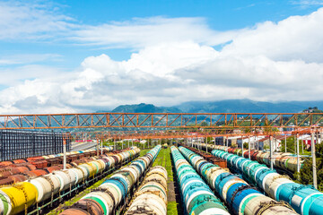 Railway tanks of different colors at the station